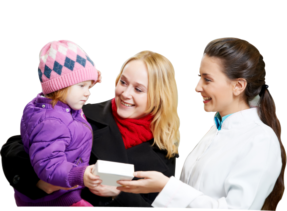 A medical professional giving a box of medicine to the child